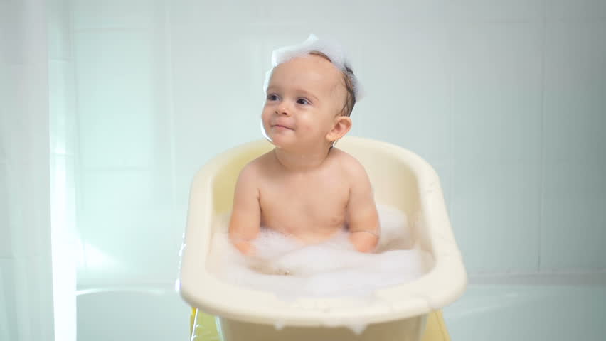 Two Year Old Boy Plays In The Bath Slow Motion Stock Footage Slow Motion Footage Of Happy Smiling Baby Boy Having Bath With Soap Bubbles Hd Stock