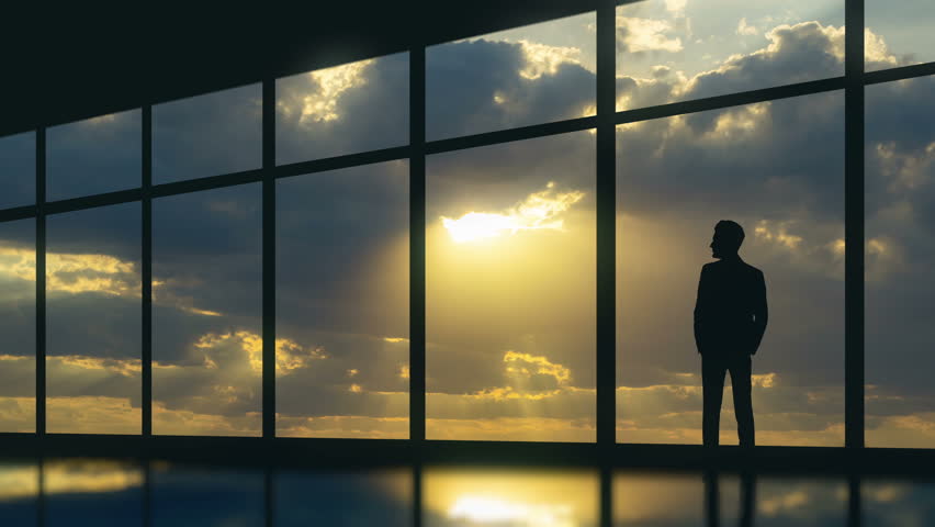 The Man Stand Near The Panoramic Window On The Night City Background ...