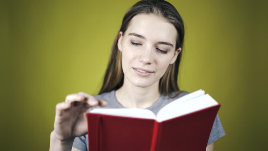 Beautiful Young Girl In Nerd Glasses Reading A Book Stock Footage Video ...