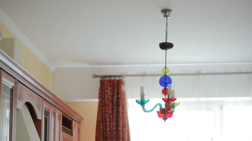 A Handsome Man Shirt Changes Light Bulb To Crystal Lamp Stock Chandelier Ceiling Lamp Swinging In The Event Of An Earthquake Hd Stock Footage