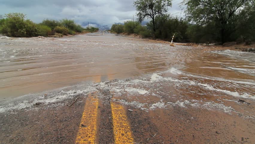 Heavy Rains Overflow Arizona Desert Wash, During Summer Monsoon Season ...