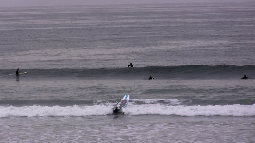 Surfers Off Pismo Beach in Stock Footage Video (100% Royalty-free