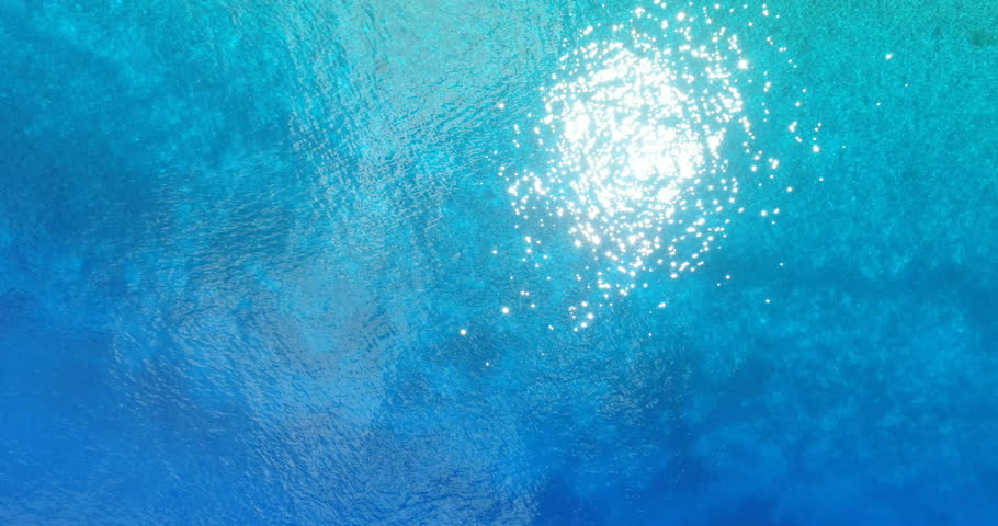 Crystal Clear Blue Ocean Water Filmed From Overhead. Stunning Water ...