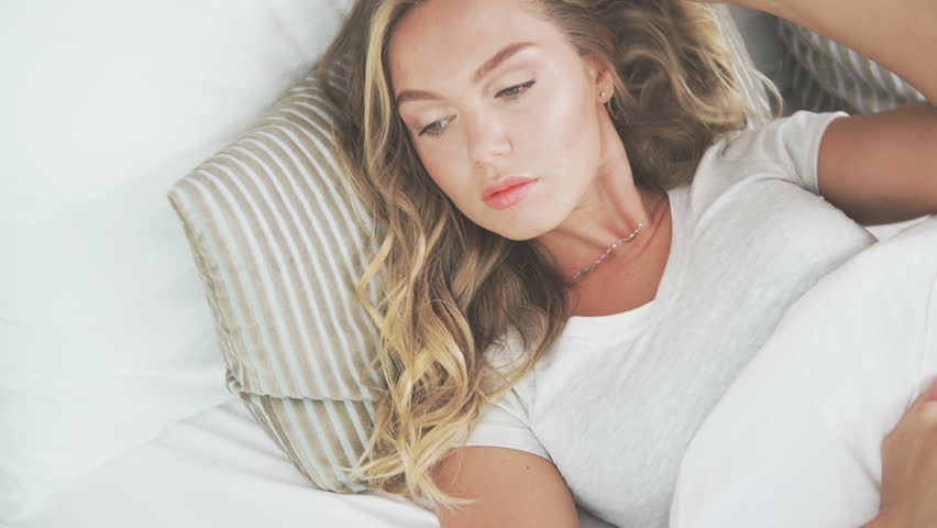 Beautiful Girl Is Sleeping And Waking Up Young Girl