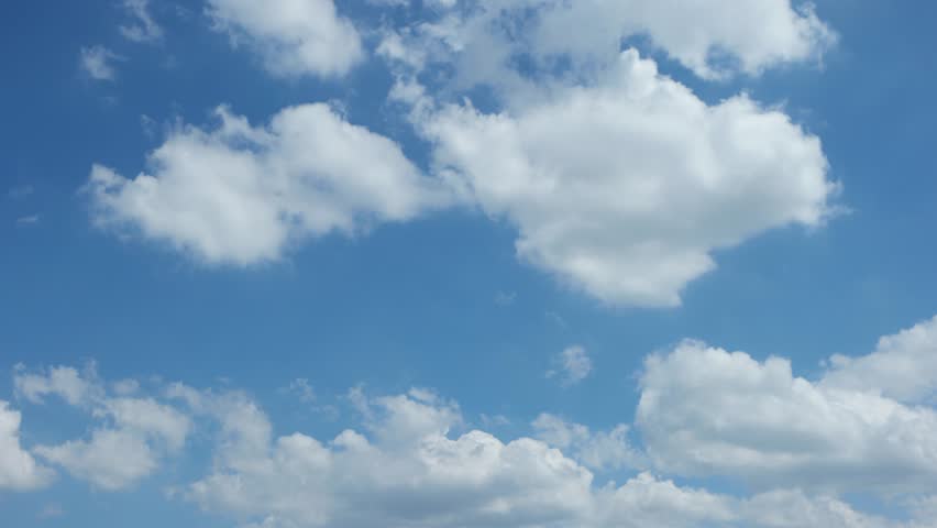 Time Lapse Clip Of White Fluffy Clouds Over Blue Sky Stock Footage ...