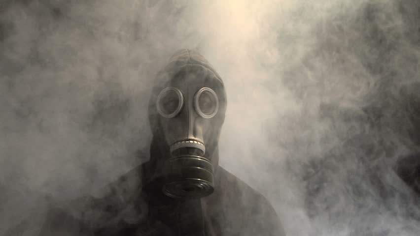 Smoke Rising Behind A Man In A Gas Mask Stock Footage Video 309907 ...