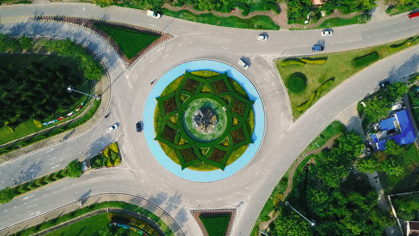 Aerial View Of Beautiful Roundabout Road Green Garden In Royal Park