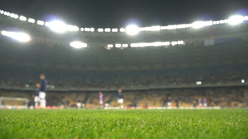 Football Field In The Stadium In Blurry Focus For Background. Stock ...