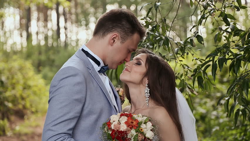 The Groom Is Going To Wedding Ceremony Stock Footage Video The Bride And Groom In Forest They Are Close Look Into Each Other S