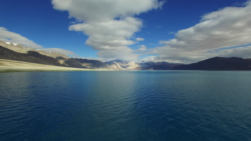 Long View Of The Landscape Of Indian Lake With Sky And Clouds Image