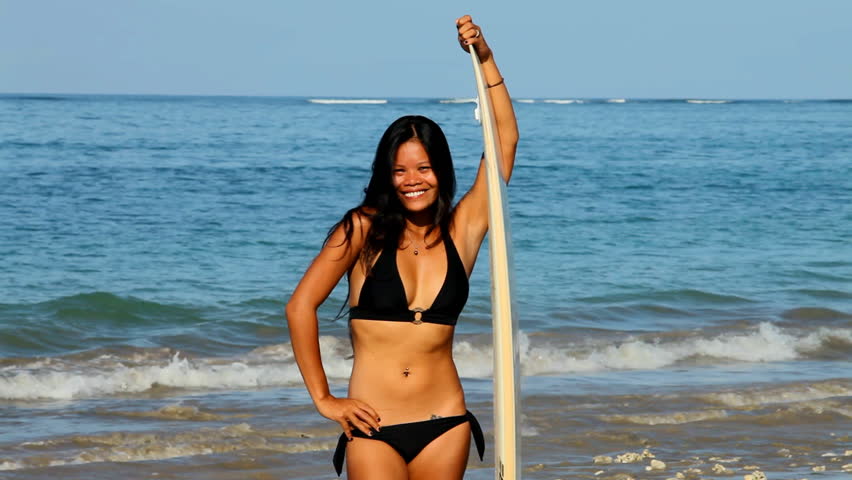 Woman In Bikini With Surfboard On Beach In Bali Stock -7903