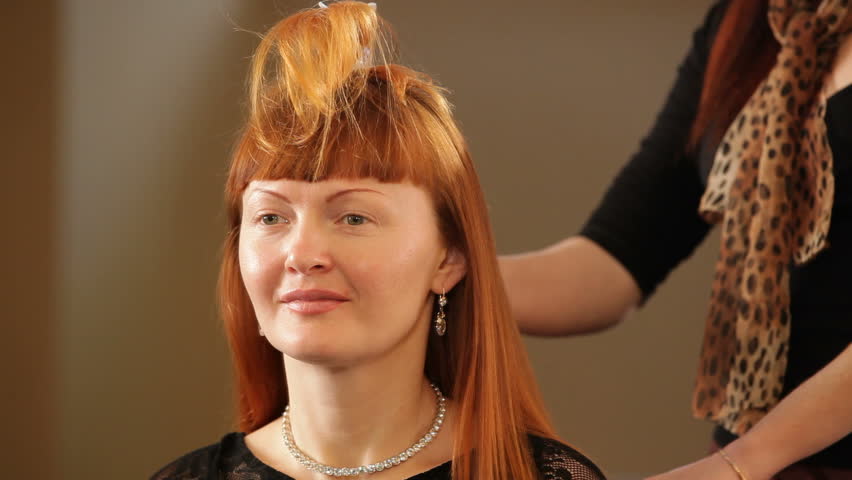 Woman Is Making Model S Hair Straight