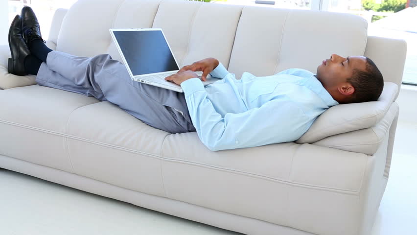 Hd00 11businessman Falling Asleep On The Sofa With Laptop In The