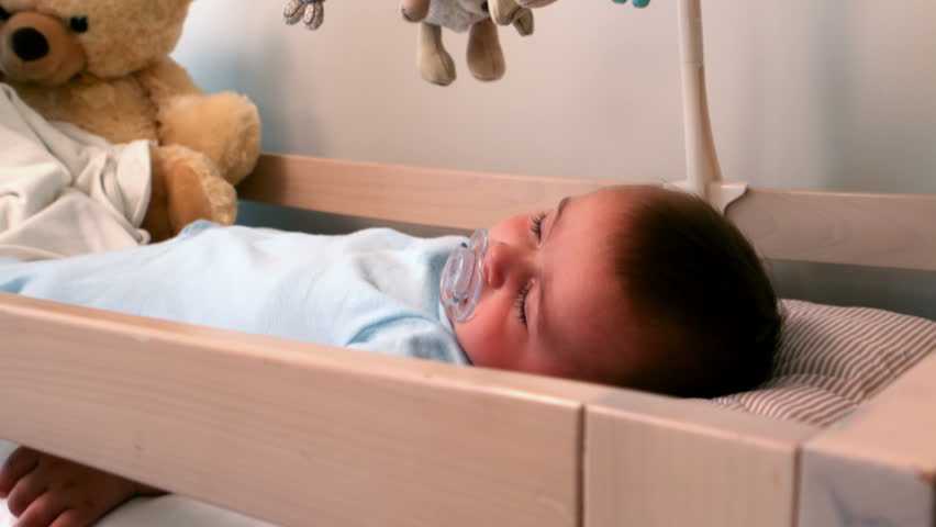 Baby Boy Sleeping In Crib Stockvideos Filmmaterial 100