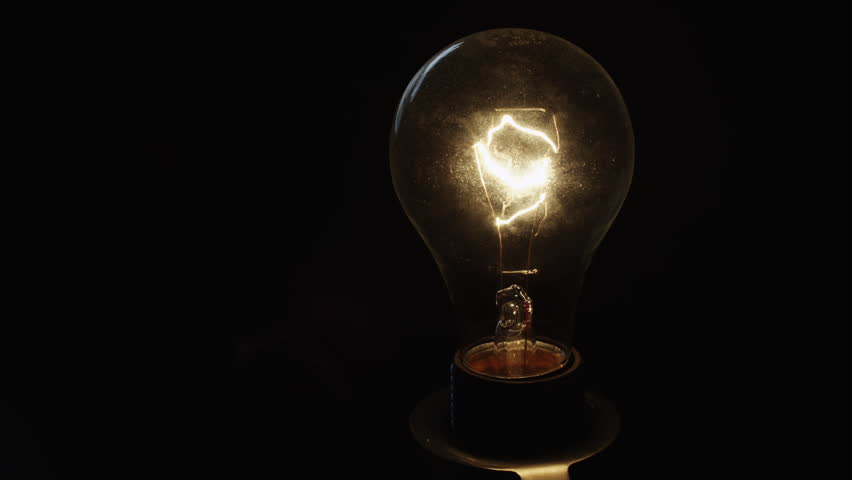 Stock Video Clip of Close Up Man's hands covering light bulb | Shutterstock