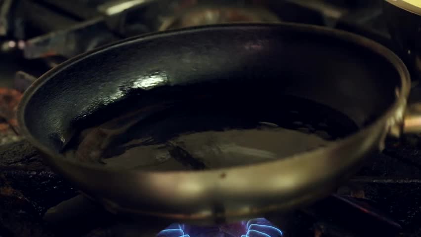 Restaurant Kitchen Video close-up of chef hands cooking and preparing in restaurant kitchen Restaurant Kitchen Video close-up of chef hands cooking and preparing in restaurant kitchen