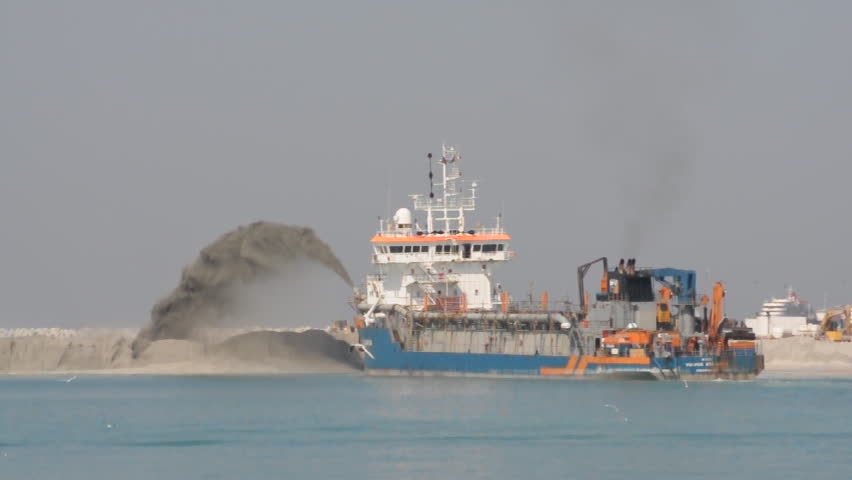 Dredging Ship Creating New Land In Dubai, United Arab Emirates Stock