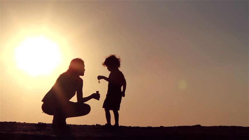 Silhouette Mother And Son Playing Stock Footage Video 100