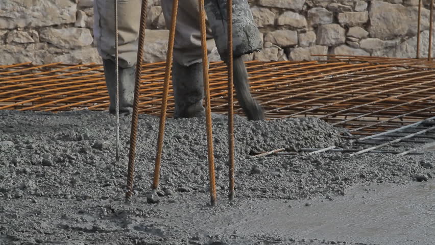 Concrete Pouring Works During Commercial Concreting Floors Laborer 