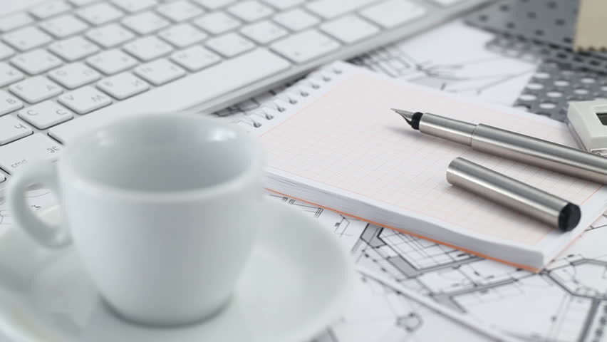 Architectural Drawings Of Modern Houses keyboard, white cup, notepad, pen ,and architectural drawings of Architectural Drawings Of Modern Houses keyboard, white cup, notepad, pen ,and architectural drawings of