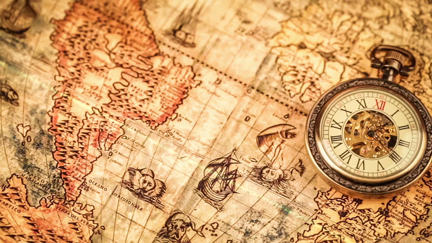 vintage antique pocket watch on ancient world map in 1565 vintage antique pocket watch on ancient world map in 1565