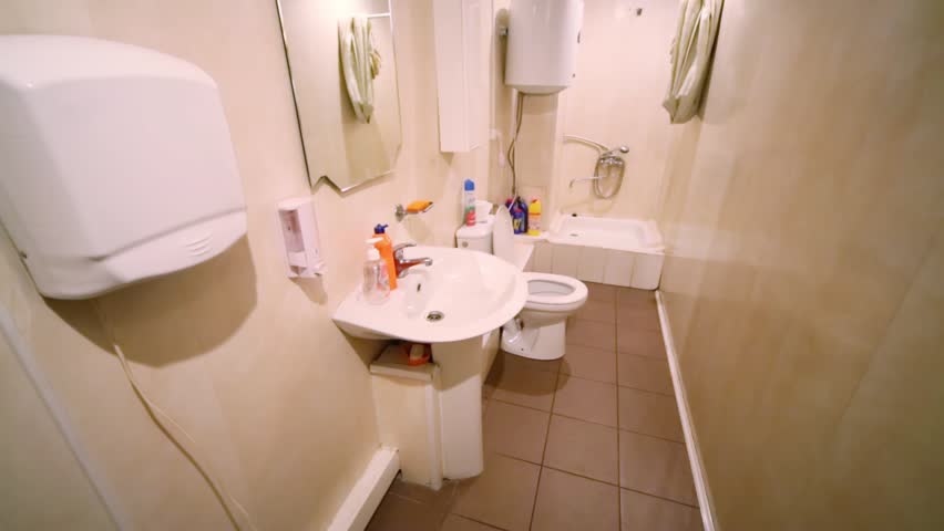 Bathroom Hand Dryer Stock Footage Video Shutterstock Light Bathroom With Shower Toilet Sink And Hand Dryer