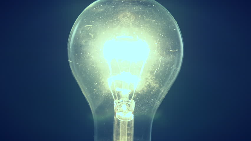 Light Bulb On Blue Background. Stock Footage Video (100% Royalty-free) 9200858 | Shutterstock