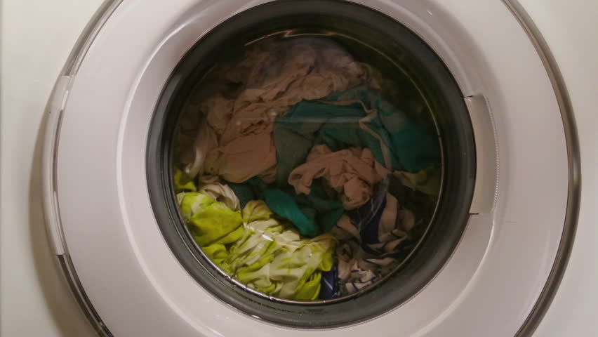 Modern Washing Machine . Washing Machine Door With Rotating Garments ...