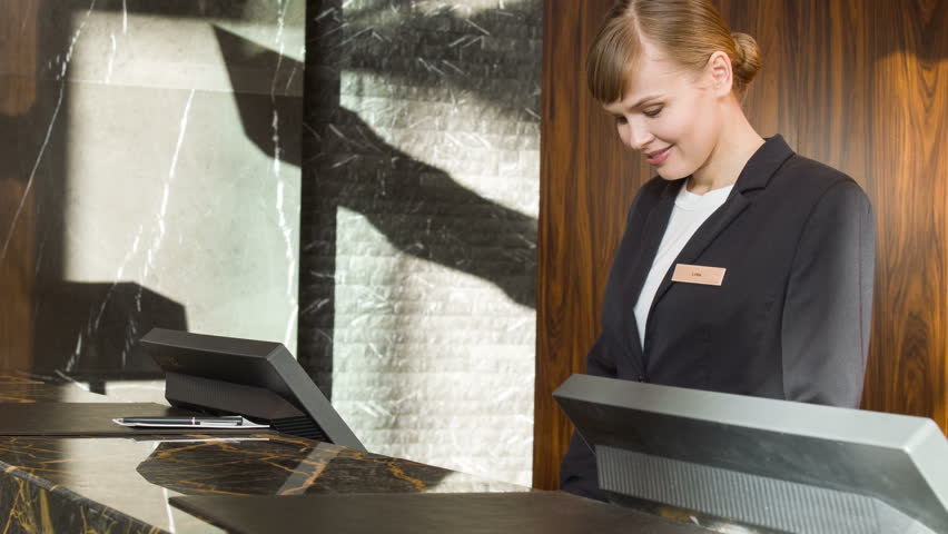 Hotel Receptionist Stock Footage Video | Shutterstock