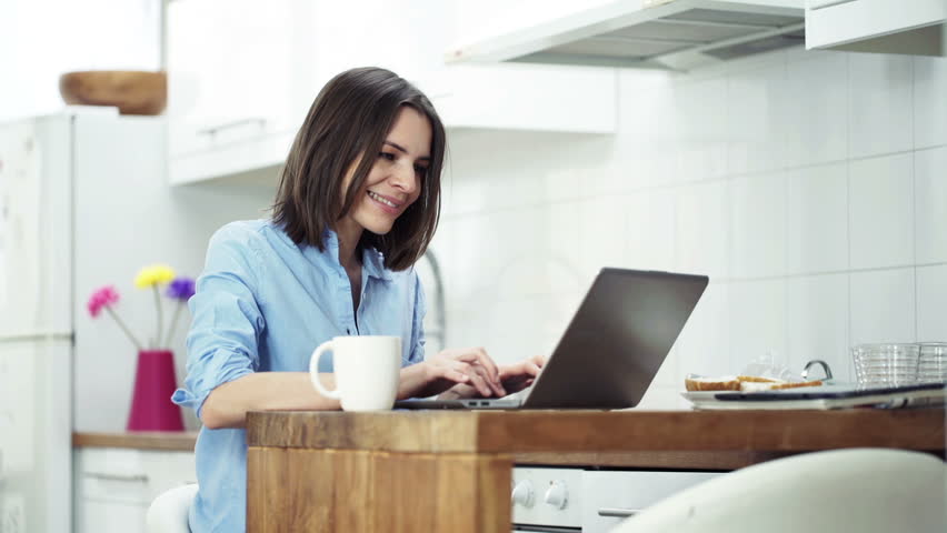 Young, Pretty Woman Using Laptop Video de stock (totalmente libre ...