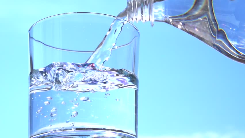 Download Bottle Of Water Pouring Into A Glass, Slow Motion Stock ... Yellowimages Mockups